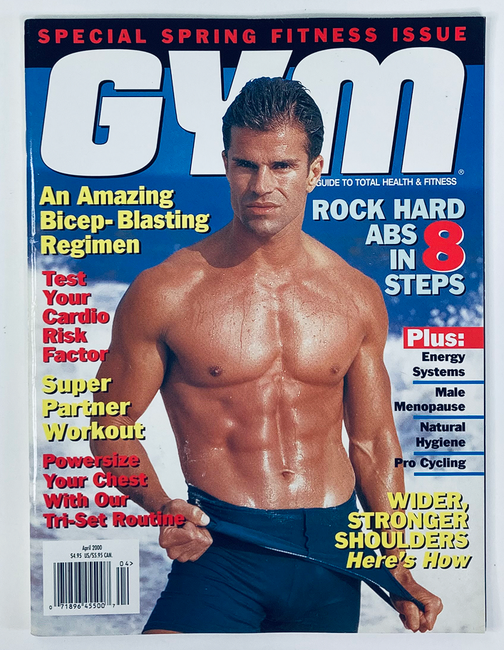 Gym Magazine April 2000 featuring an amazing bicep-blasting regimen on the cover, showcasing a fit male model with rock-hard abs, emphasizing total health and fitness.