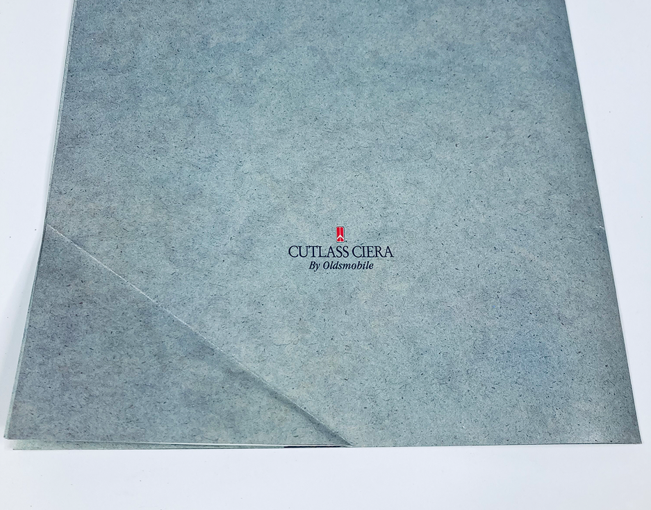 Close-up of the 1994 Oldsmobile Cutlass Ciera Dealer Showroom Sales Brochure Guide Catalog cover showing elegant branding and design.