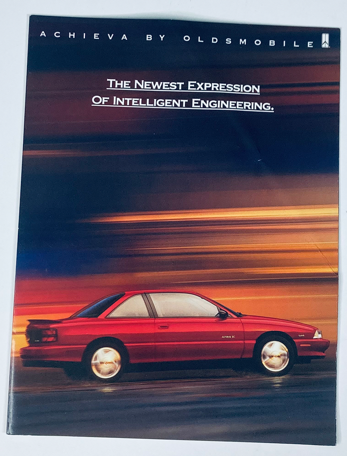 1992 Oldsmobile Achieva Dealer Showroom Sales Brochure featuring a vibrant red Achieva model on a dynamic background, showcasing its intelligent engineering.