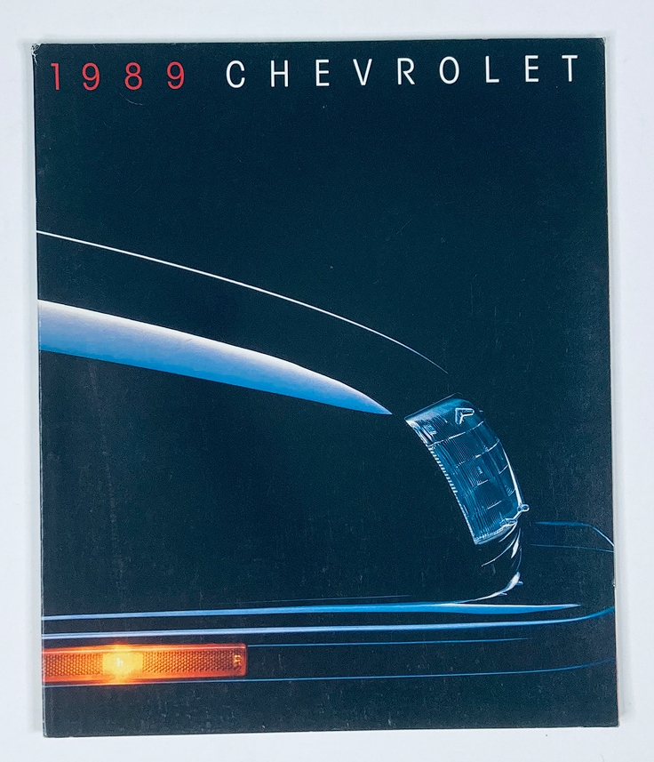 Cover of the 1989 Chevrolet Lineup Dealer Showroom Sales Brochure Guide Catalog featuring the sleek front end of a Chevrolet vehicle against a dark background.