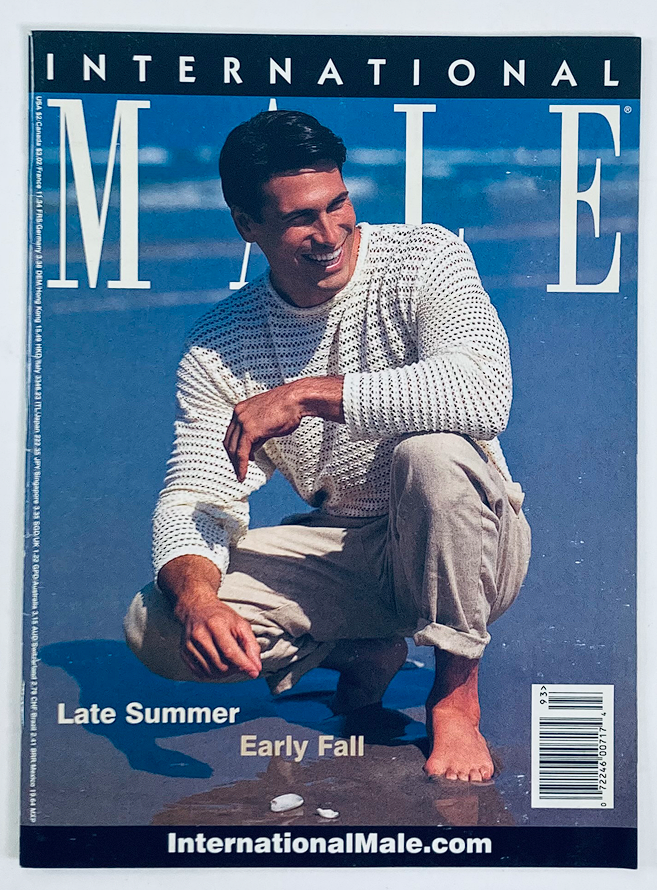 Cover of the 1999 Late Summer Early Fall International Male Magazine Catalog featuring a smiling male model in casual beach attire.