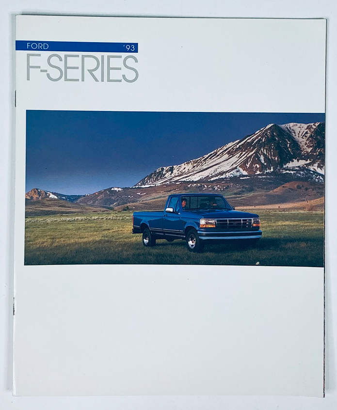 Cover of the 1993 Ford F-Series Dealer Showroom Sales Brochure Guide Catalog featuring a blue Ford truck in a scenic mountain landscape, showcasing the iconic F-Series design.