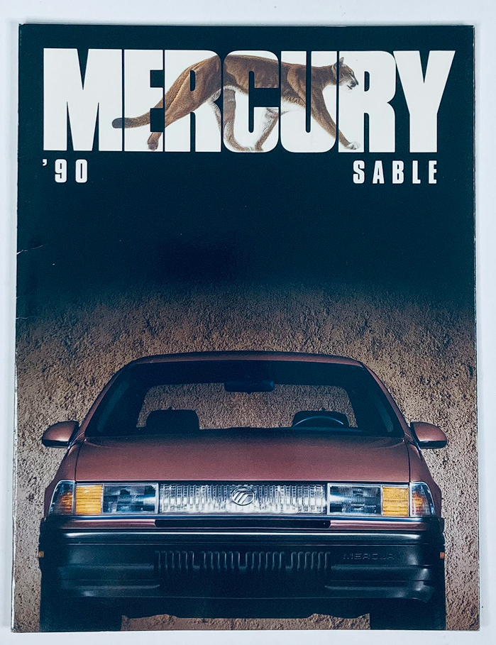 Cover of the 1990 Mercury Sable Dealer Showroom Sales Brochure Guide Catalog featuring the front view of the car against a textured background.