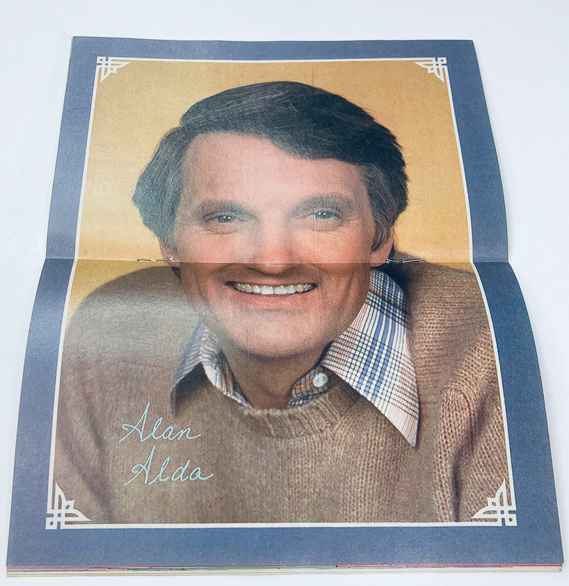 Inside of VTG SuperMag Magazine Vol 4 No. 12 with a mini-poster of Alan Alda, displaying his friendly smile, emphasizing the nostalgia and charm of vintage pop culture.