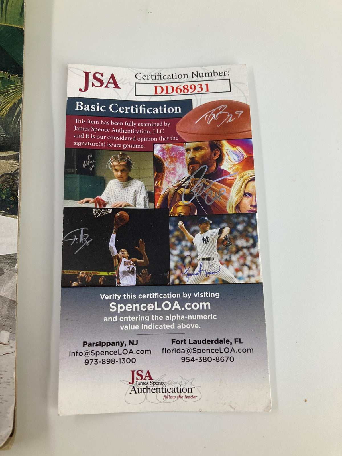 JSA Certification card for the Andre Miller ESPN Magazine, confirming the authenticity of the autograph with certificate number DD68931, from James Spence Authentication.