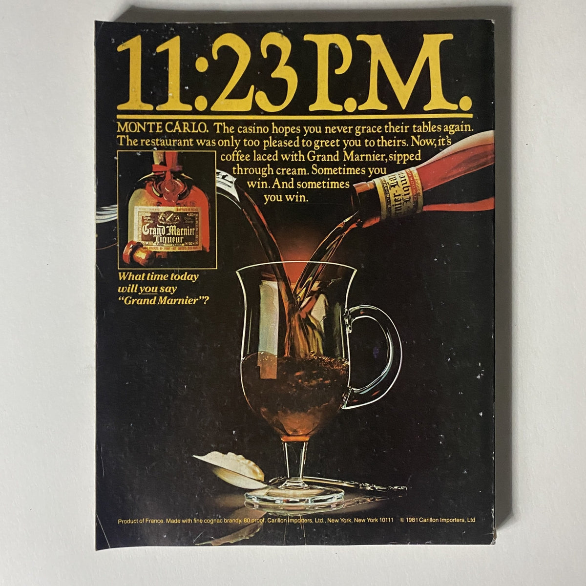 VTG Vogue Magazine February 1982 Mariel Hemingway by Bill King - Vintage advertisement for Grand Marnier featuring a glass cup filled with coffee and liqueur, showcasing classic 1980s design elements.