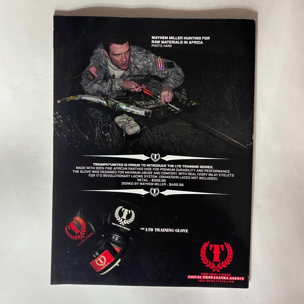 Back cover of Elite Fighter Magazine April 2008 Vol 3 No. 4 featuring an advertisement for training gloves with a soldier handling a bow in a nighttime setting.