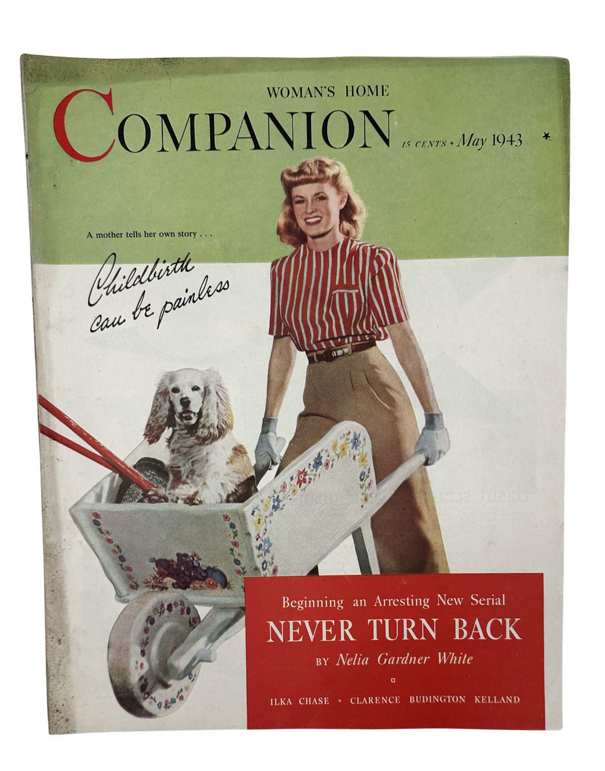Cover of Woman’s Home Companion Magazine May 1943 featuring the title 'Never Turn Back' by Nelia Gardner White, showcasing a woman smiling while pushing a wheelbarrow and accompanied by a dog, highlighting themes of motherhood.