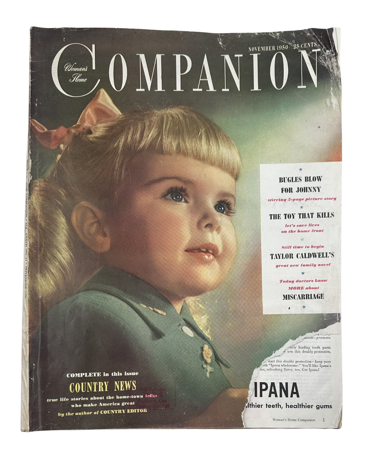 Cover of Woman’s Home Companion Magazine November 1950 featuring a young girl with blonde hair, showcasing the title 'The Toy That Kills' and articles such as 'Bugles Blow for Johnny' and 'Taylor Caldwell's' work.