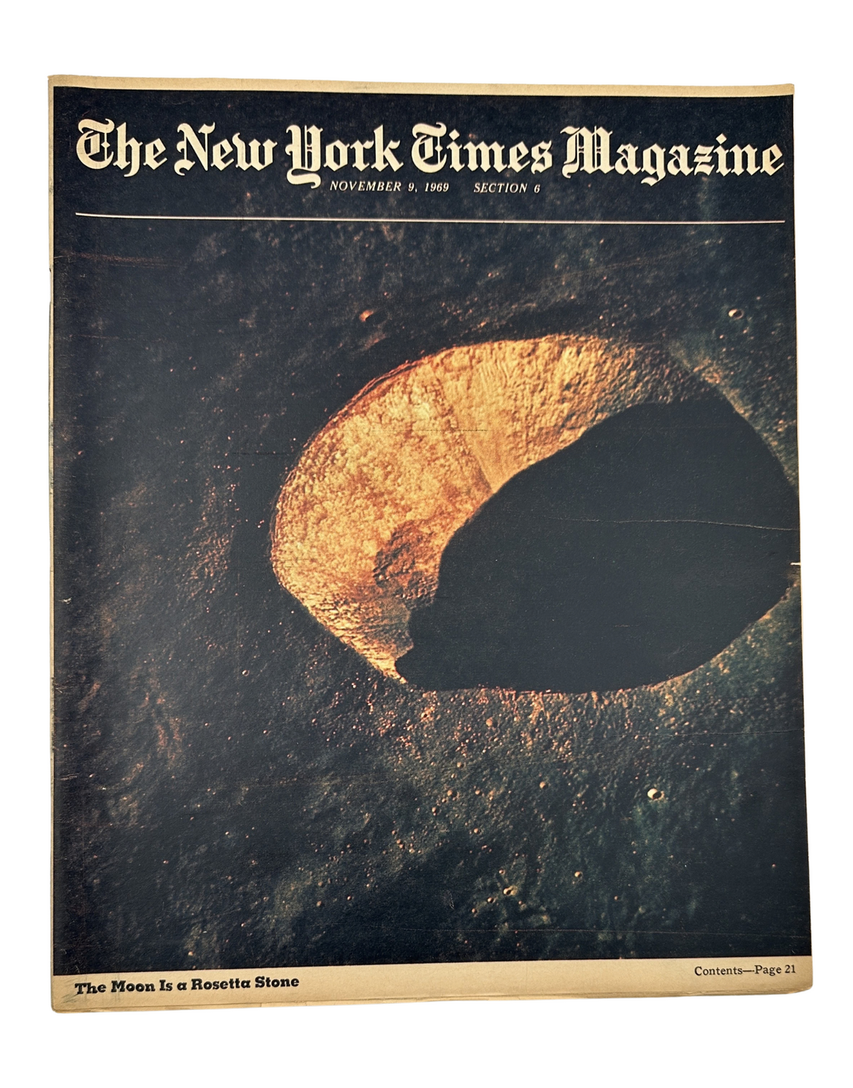 Cover of The New York Times Magazine, November 9, 1969, titled 'The Moon Is A Rosetta Stone'. The cover features a striking image of the moon's surface, capturing its unique textures and shadows.