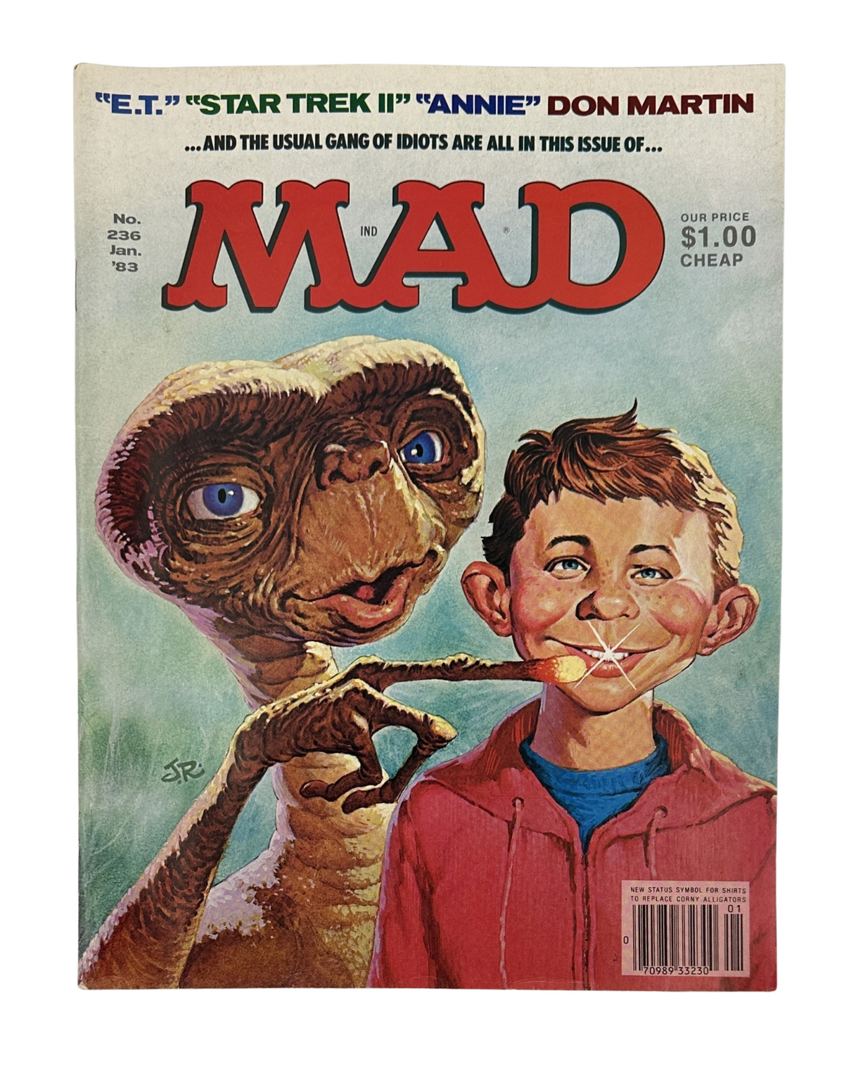 Cover of MAD Magazine No. 236 from January 1983 featuring a parody of E.T. and a young boy, showcasing humorous artwork by the artist SR.