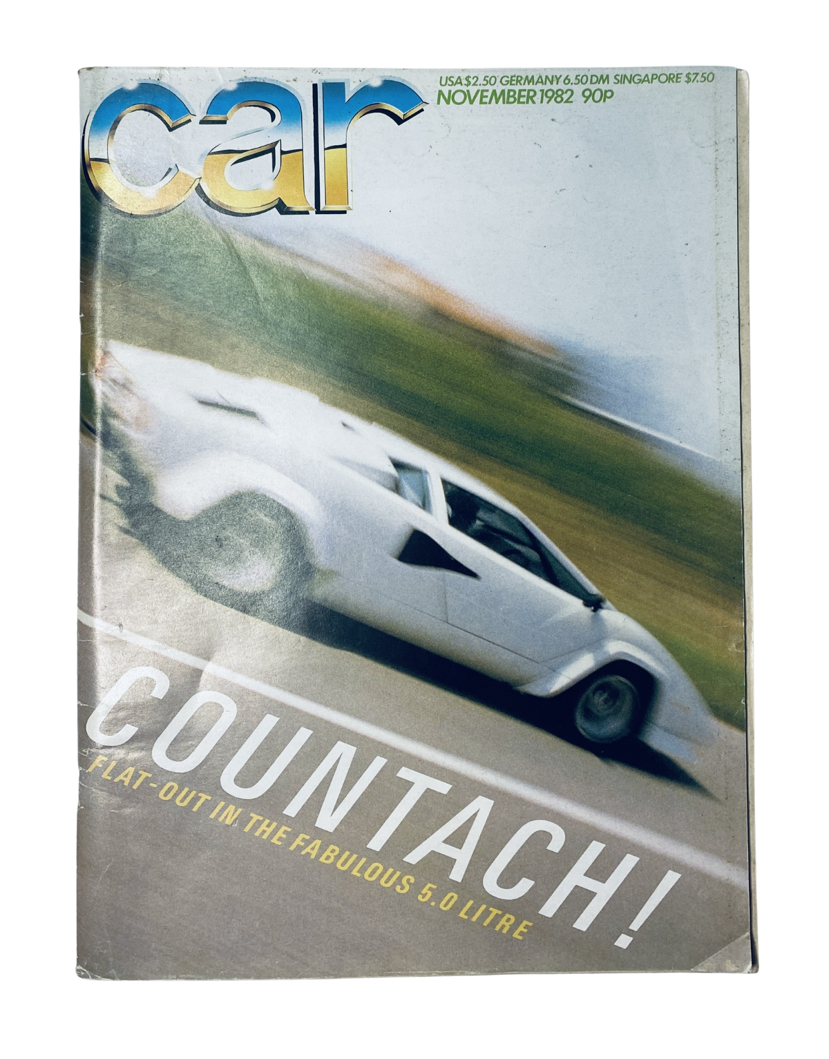 Cover of CAR Magazine November 1982 featuring the Lamborghini Countach with the title 'COUNTACH! Flat-out in the fabulous 5.0 litre.' This iconic car magazine showcases automotive excellence and design.