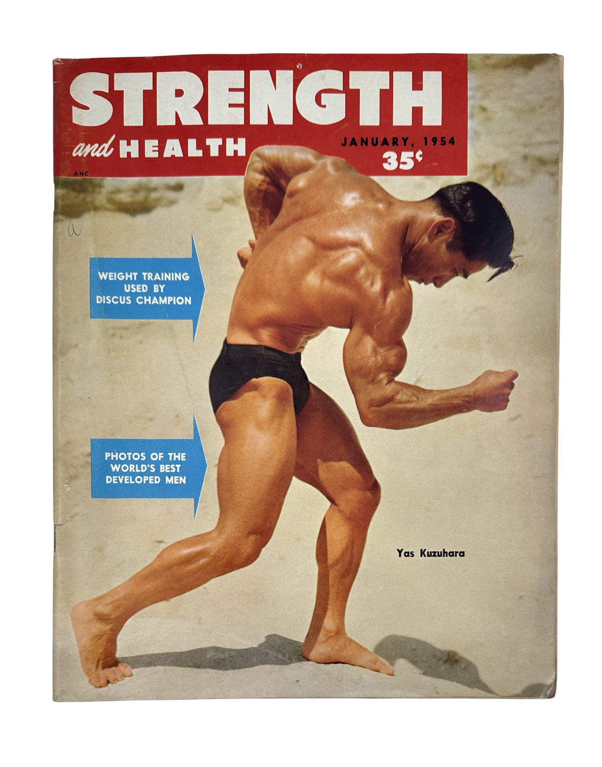 Strength and Health Magazine January 1954 cover featuring Yas Kuzuhara, showcasing a muscular man in a dynamic pose, emphasizing weight training and fitness.