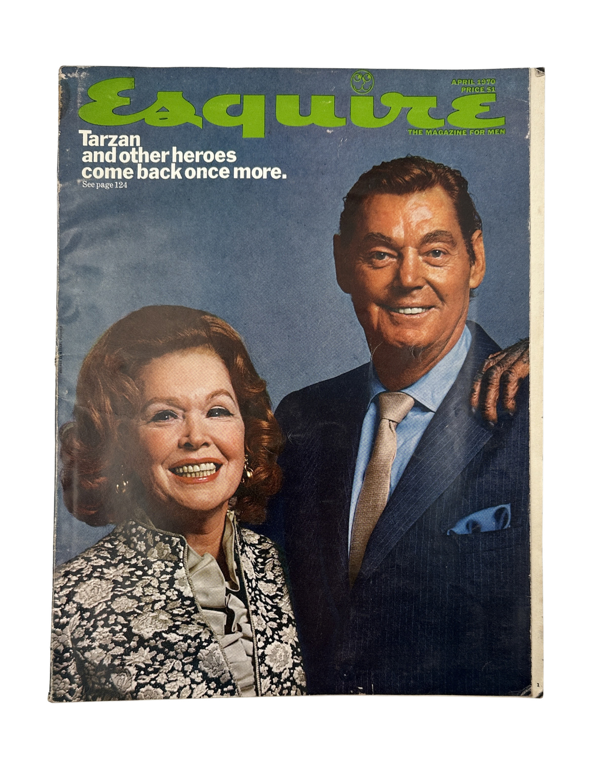 Esquire Magazine April 1970 cover featuring Tarzan and other heroes. The magazine showcases a striking image of a couple, highlighting the article 'Tarzan and other heroes come back once more.' This vintage publication is a collector's item reflecting the culture of the era.