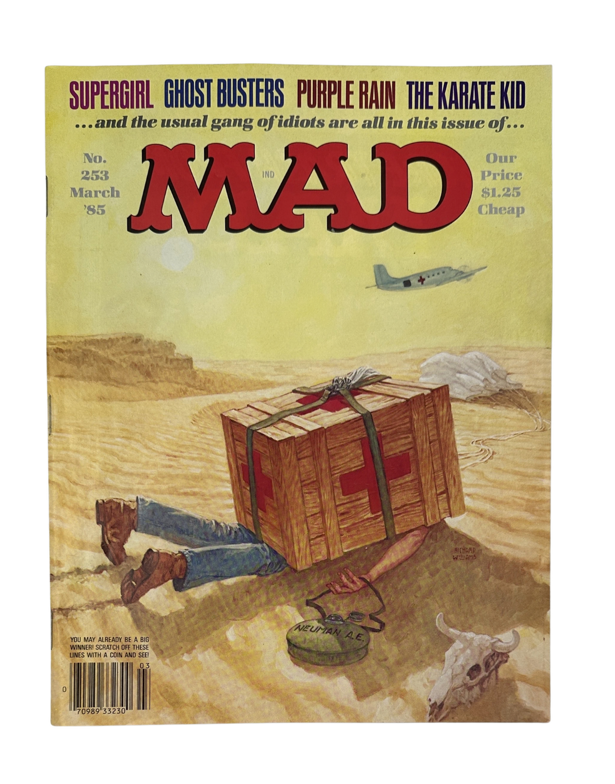 MAD Magazine No. 253 Cover from March 1985 featuring Ghostbusters, Purple Rain, and The Karate Kid. Showcases vibrant illustrations and a desert backdrop.