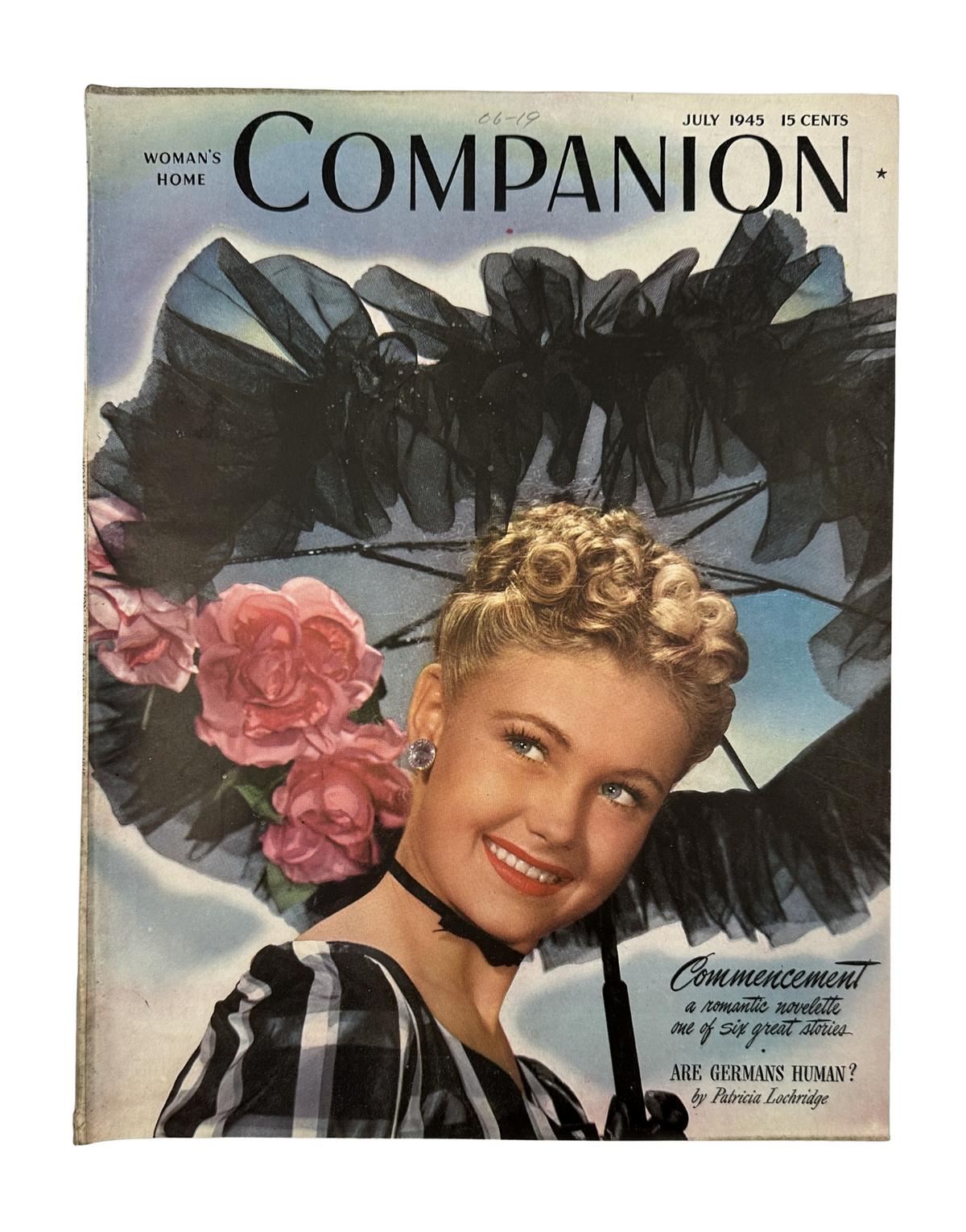 Cover of Woman’s Home Companion Magazine July 1945 featuring Shirley Johns with an umbrella and roses, showcasing the theme 'Commencement'.