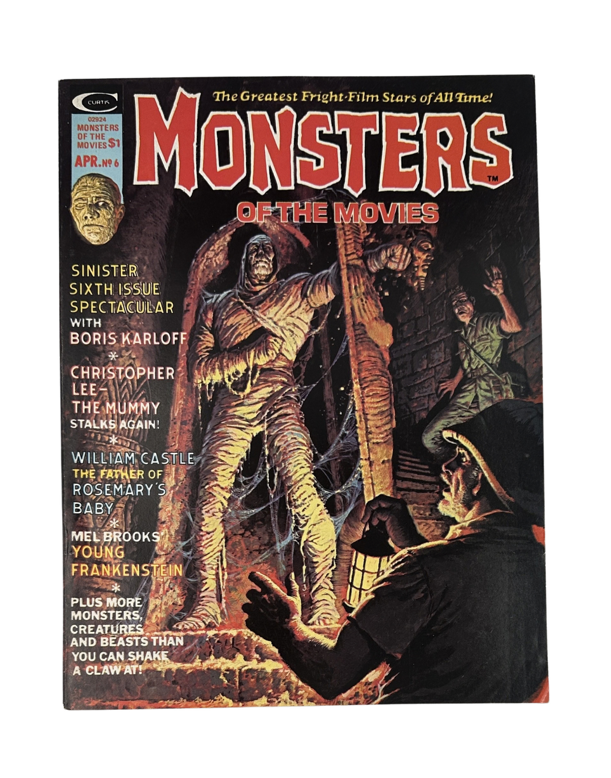 Monsters of the Movies No. 6 April featuring Boris Karloff and Young Frankenstein, showcasing a vintage horror magazine cover with an illustration of a mummy and a creature in a crypt.
