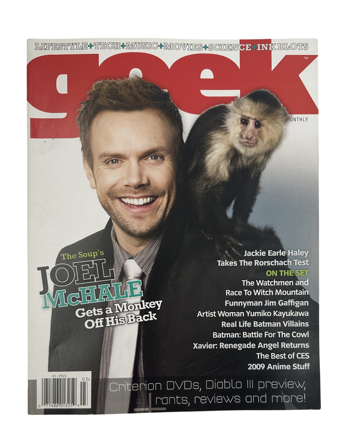 Geek Magazine March 2009 cover featuring Joel McHale with a monkey, highlighting the issue's focus on entertainment with articles on Jim Gaffigan and Watchmen.