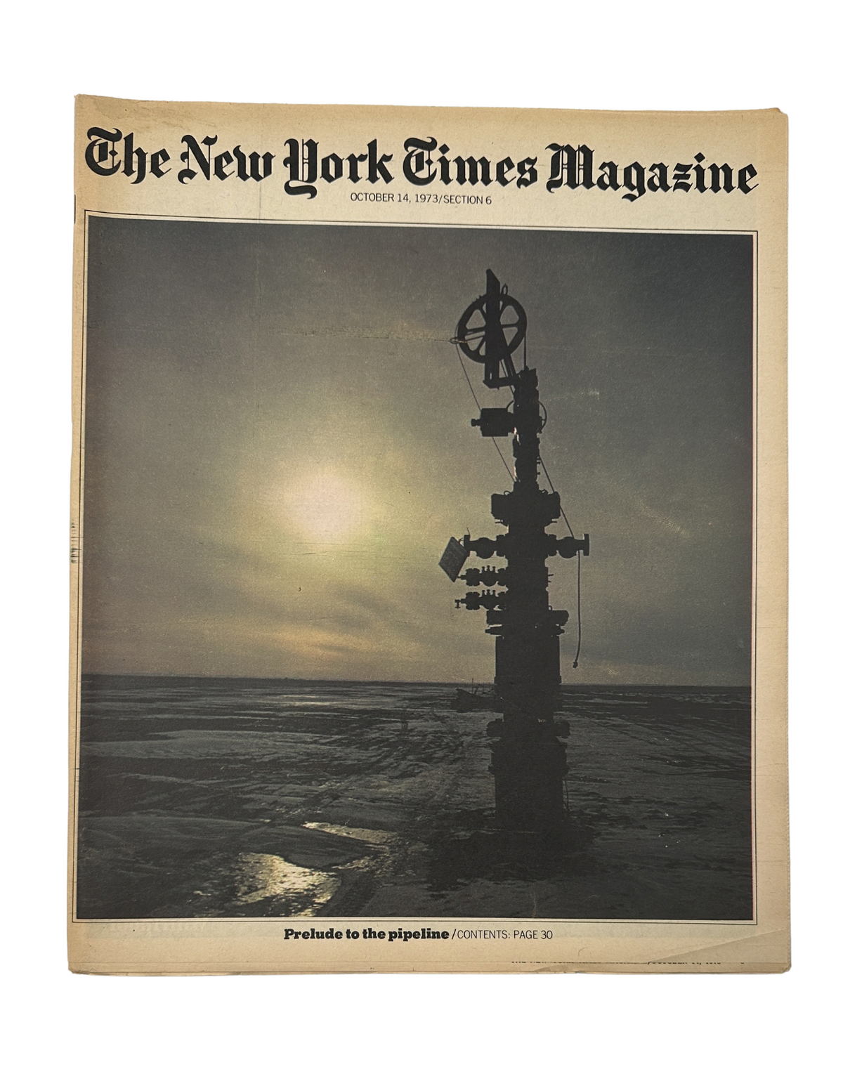 Cover of The New York Times Magazine dated October 14, 1973, featuring an image of a valve known as a 'Christmas tree' on Alaska's North Slope, symbolizing the Alaska Pipeline and oil exploration.