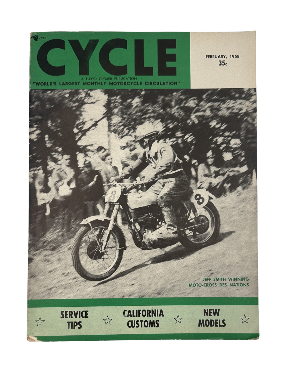 Cycle Magazine February 1958 cover featuring Jeff Smith winning at a moto-cross event, showcasing vintage motorcycle culture.