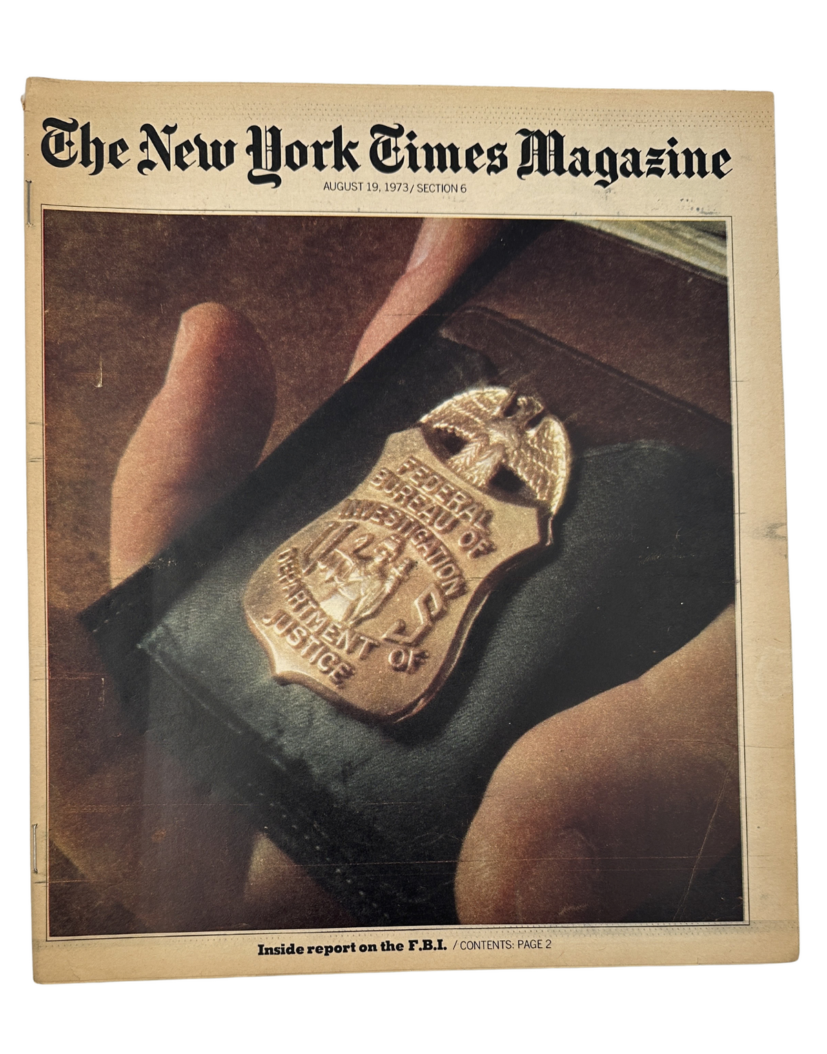 Cover of The New York Times Magazine from August 19, 1973, featuring a close-up of an FBI badge and a caption indicating an inside report on the FBI. The image showcases the magazine's vintage design and unique historical significance.