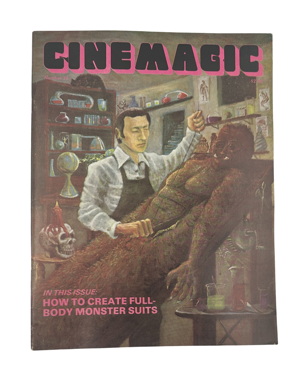Cinemagic Magazine Summer 1977 No. 10 featuring a detailed painting of a man working on a full-body monster suit, illustrating the theme 'How to Create Full-Body Monster Suits'.