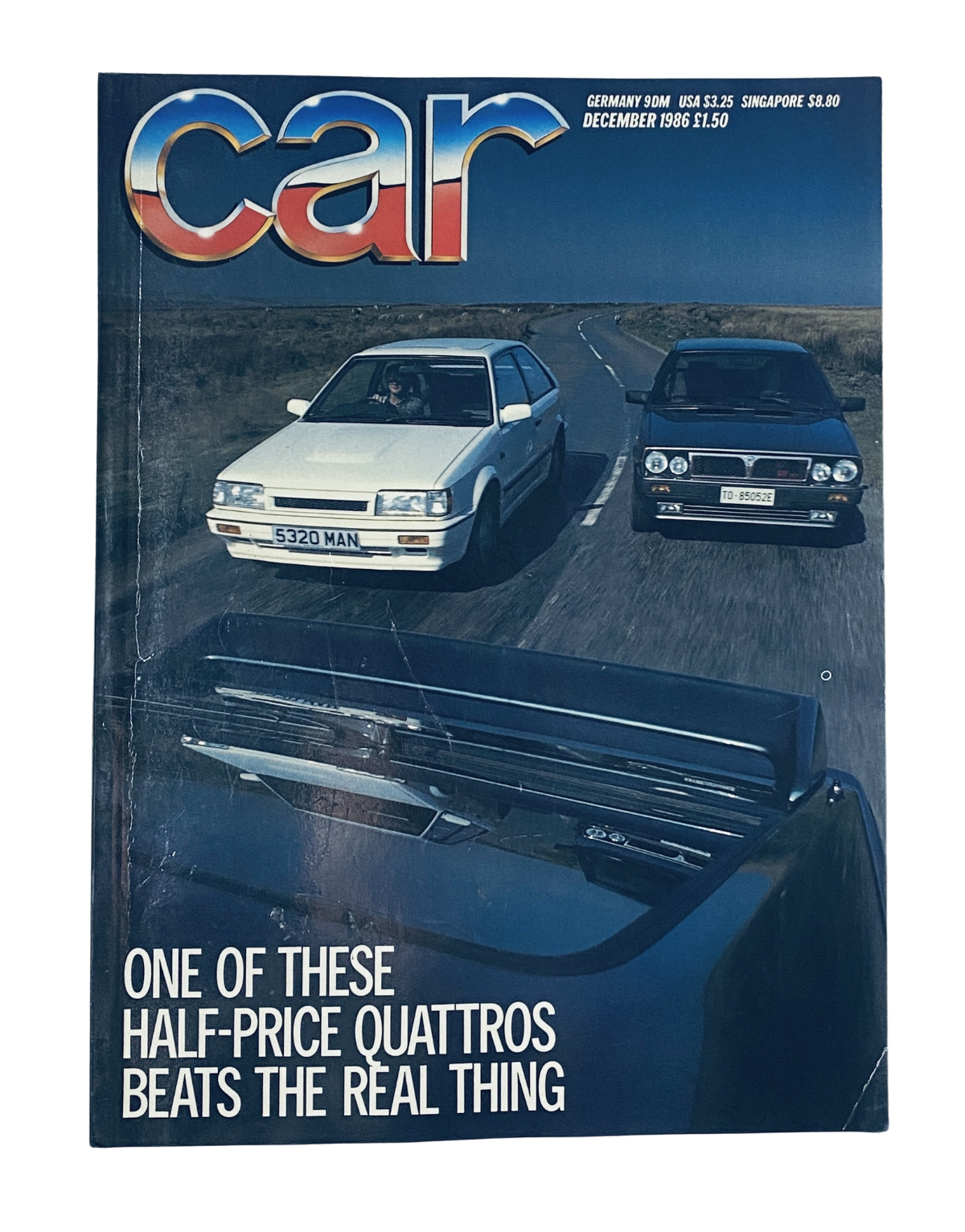 Car Magazine December 1986 cover featuring two cars on a winding road with bold title stating 'One of These Half-Price Quattros Beats the Real Thing' and eye-catching design.