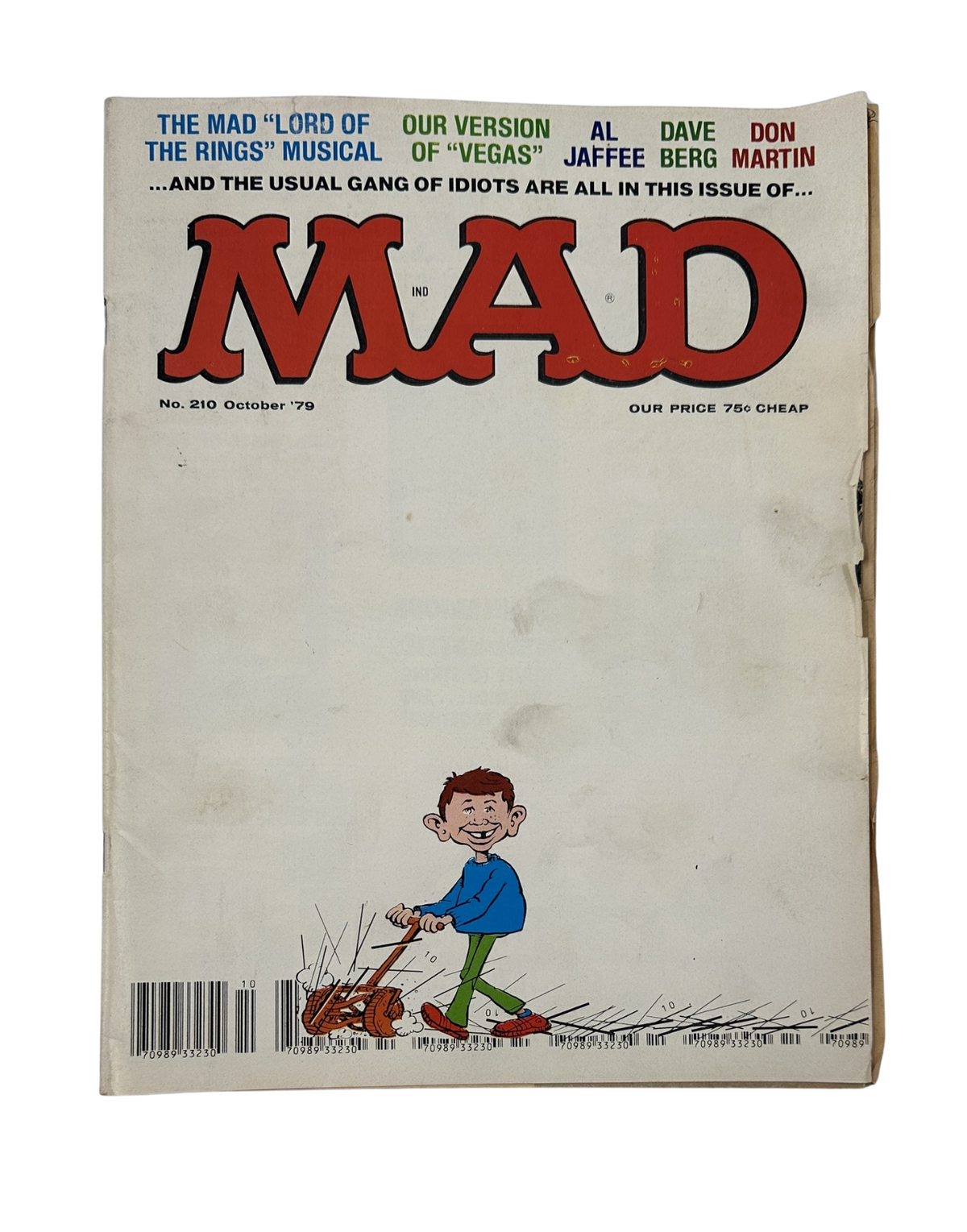 MAD Magazine No. 210 October 1979 cover featuring a character plowing a field with the caption about the 'Lord of the Rings' musical, reflecting a comedic take on popular culture.
