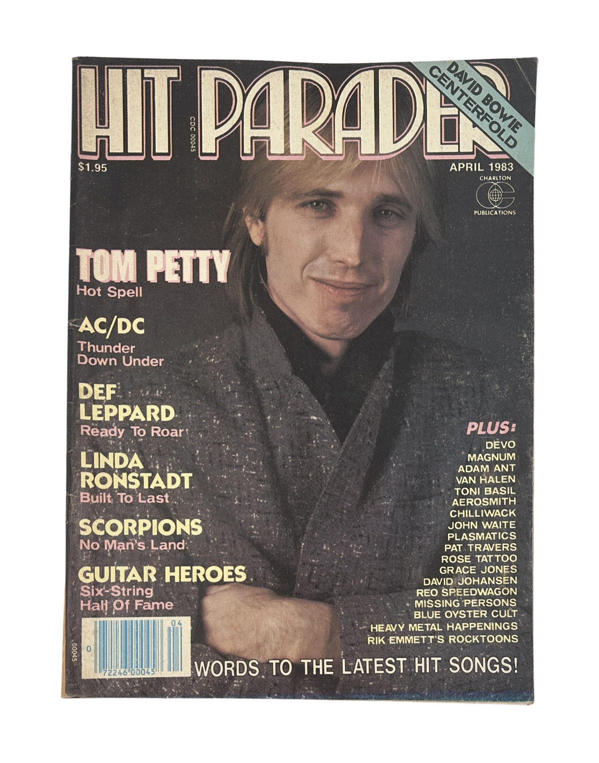 Hit Parader Magazine April 1983 cover featuring Tom Petty with the headline 'Hot Spell,' along with featured artists AC/DC and Def Leppard. Includes a centerfold of David Bowie.