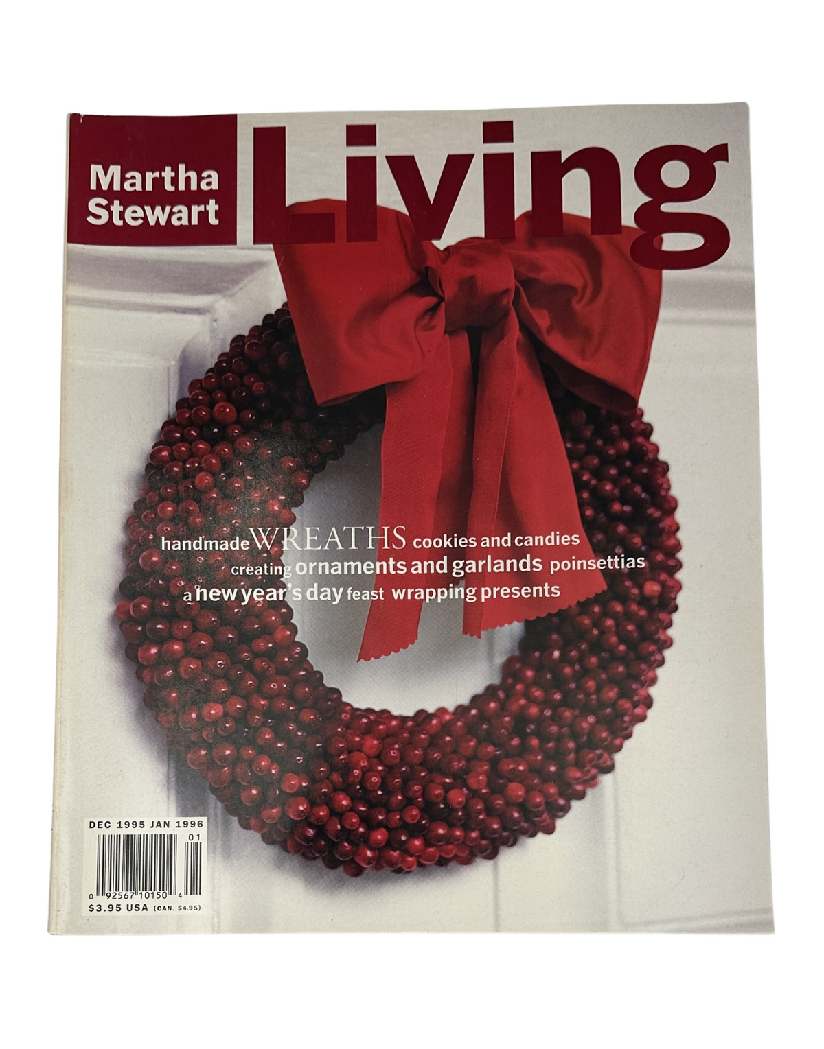 Cover of Martha Stewart Living Magazine December 1995 featuring a vibrant red wreath adorned with a bow, emphasizing the theme of wreaths and holiday cookies. The magazine showcases ideas for creating festive ornaments, garlands, and decorating for the new year.