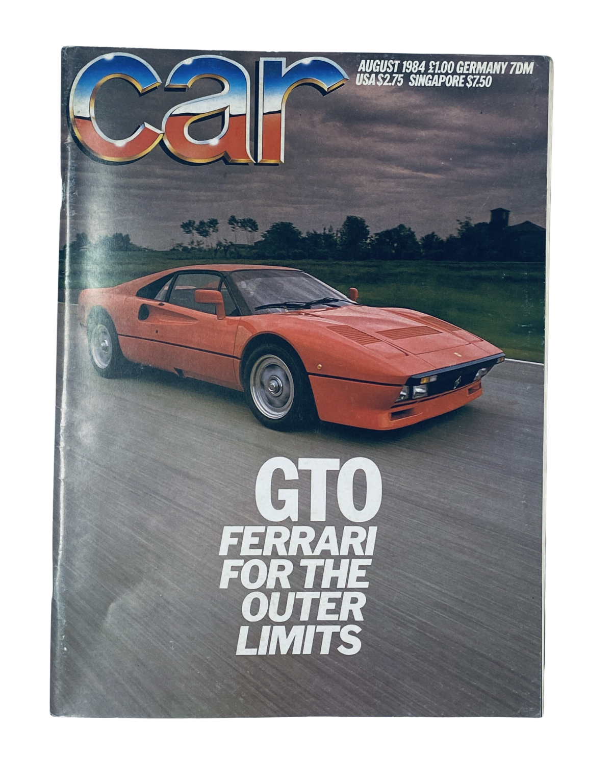Car Magazine August 1984 cover featuring the Ferrari GTO, showcasing its sleek design and powerful performance, tagged as 'GTO Ferrari for the Outer Limits'.