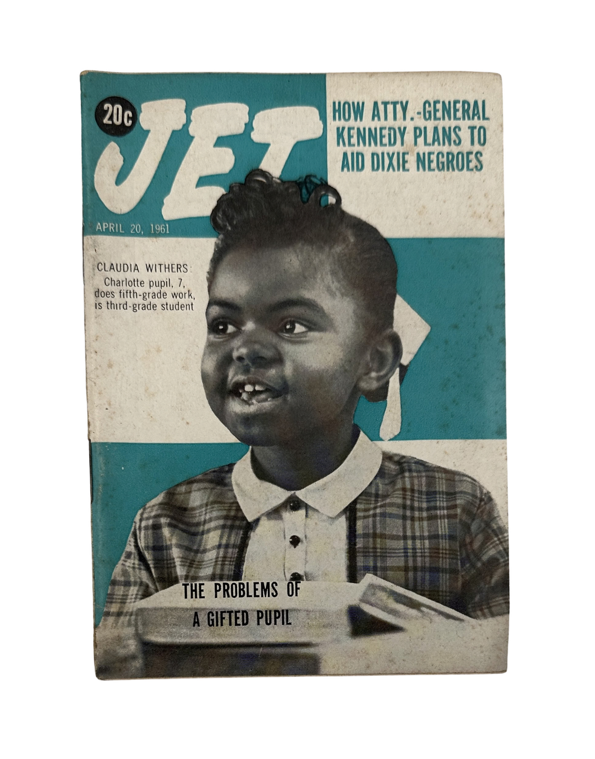 Jet Magazine April 20, 1961 featuring Claudia Withers, Atty. General Kennedy Cover, showcasing a young African American girl with a big smile, dressed in a striped shirt with a collar, representing the issues in education and civil rights during the era.