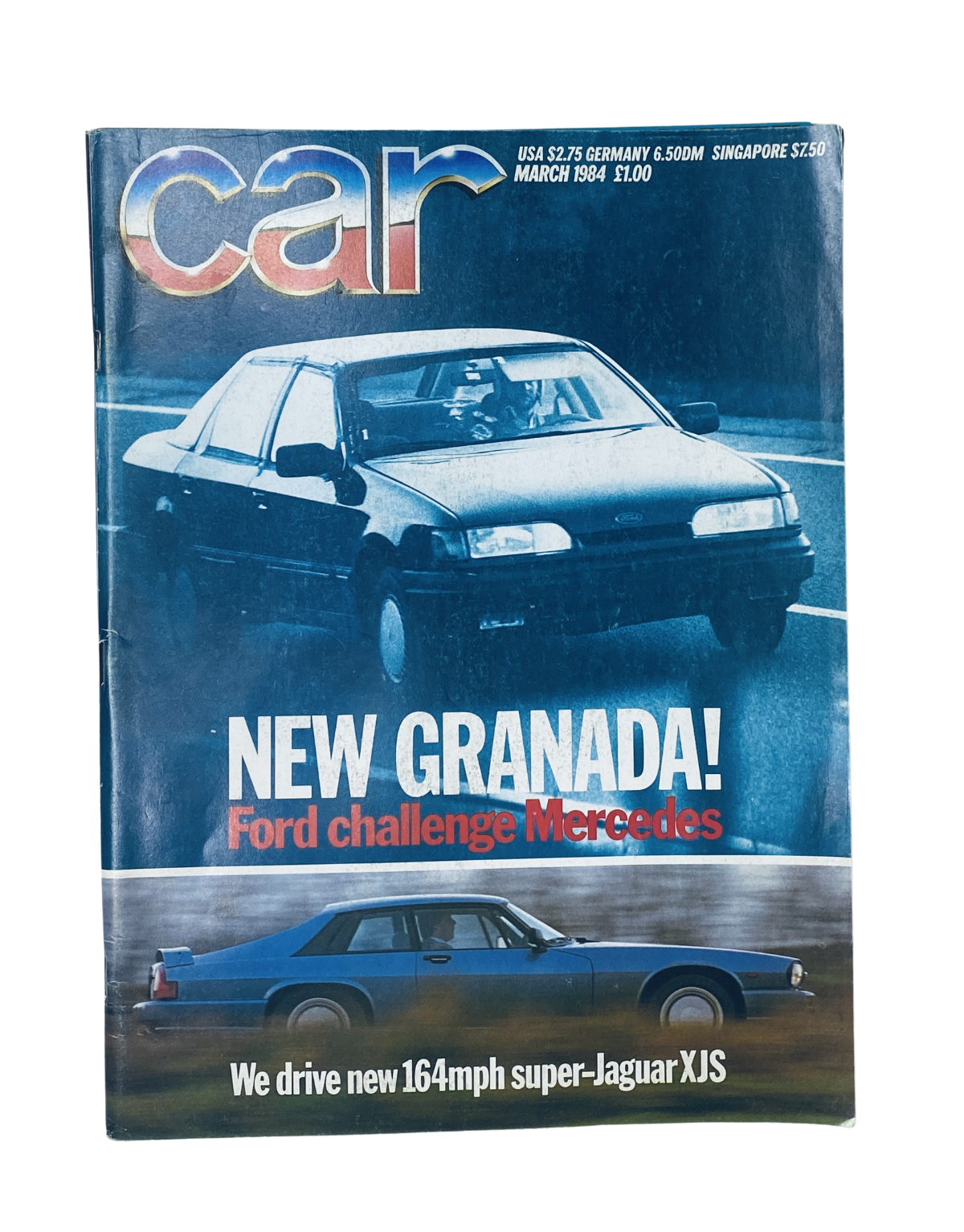 Car Magazine March 1984 cover featuring the new Ford Granada and Jaguar XJS. The headline reads 'NEW GRANADA! Ford challenge Mercedes'. Image highlights classic car design and magazine branding.