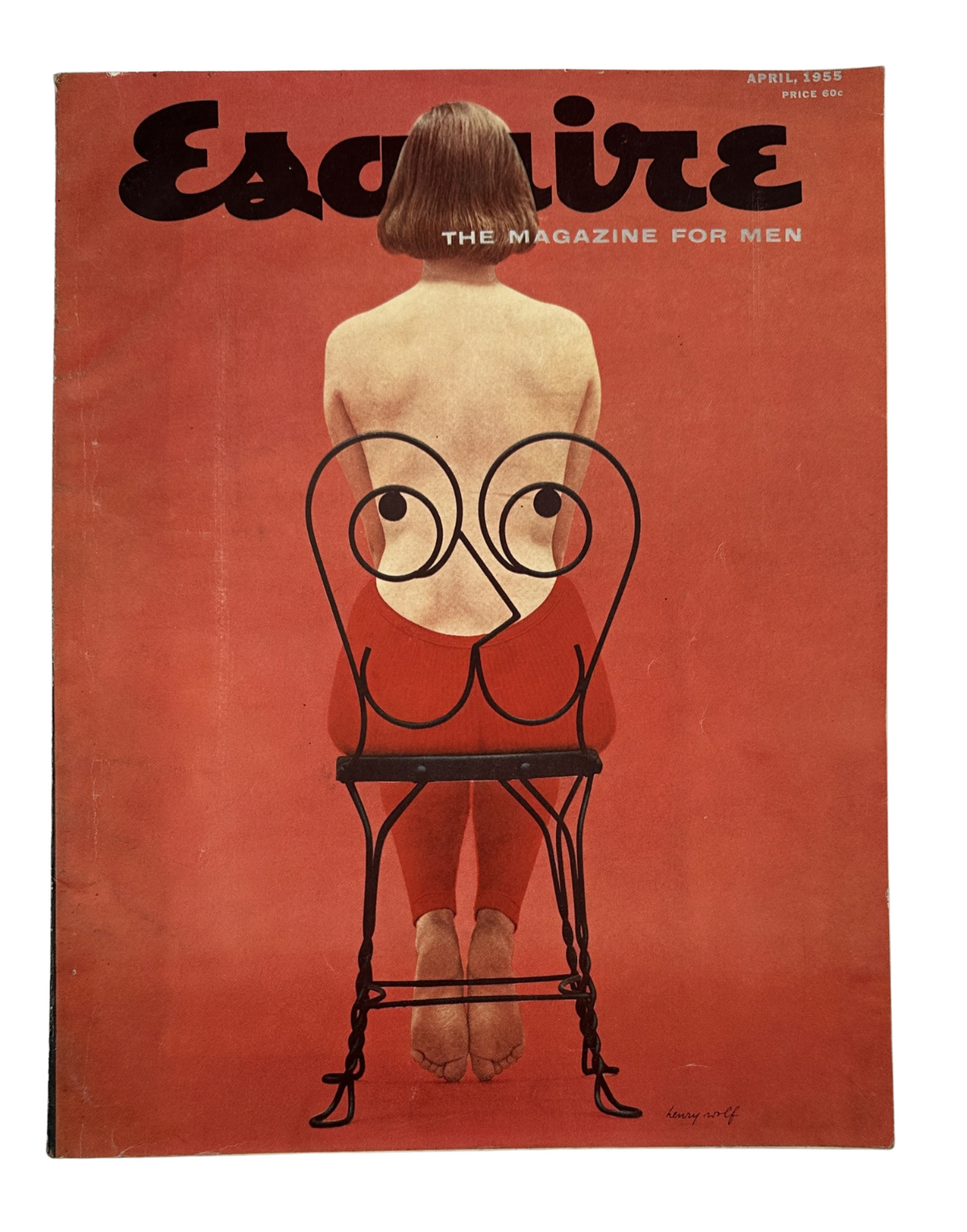 Esquire Magazine April 1955 cover featuring a striking illustration by George Petty, showcasing a woman seated on a unique chair design. The artwork emphasizes a blend of elegance and modernity, making it a collectible issue for magazine lovers and art enthusiasts.