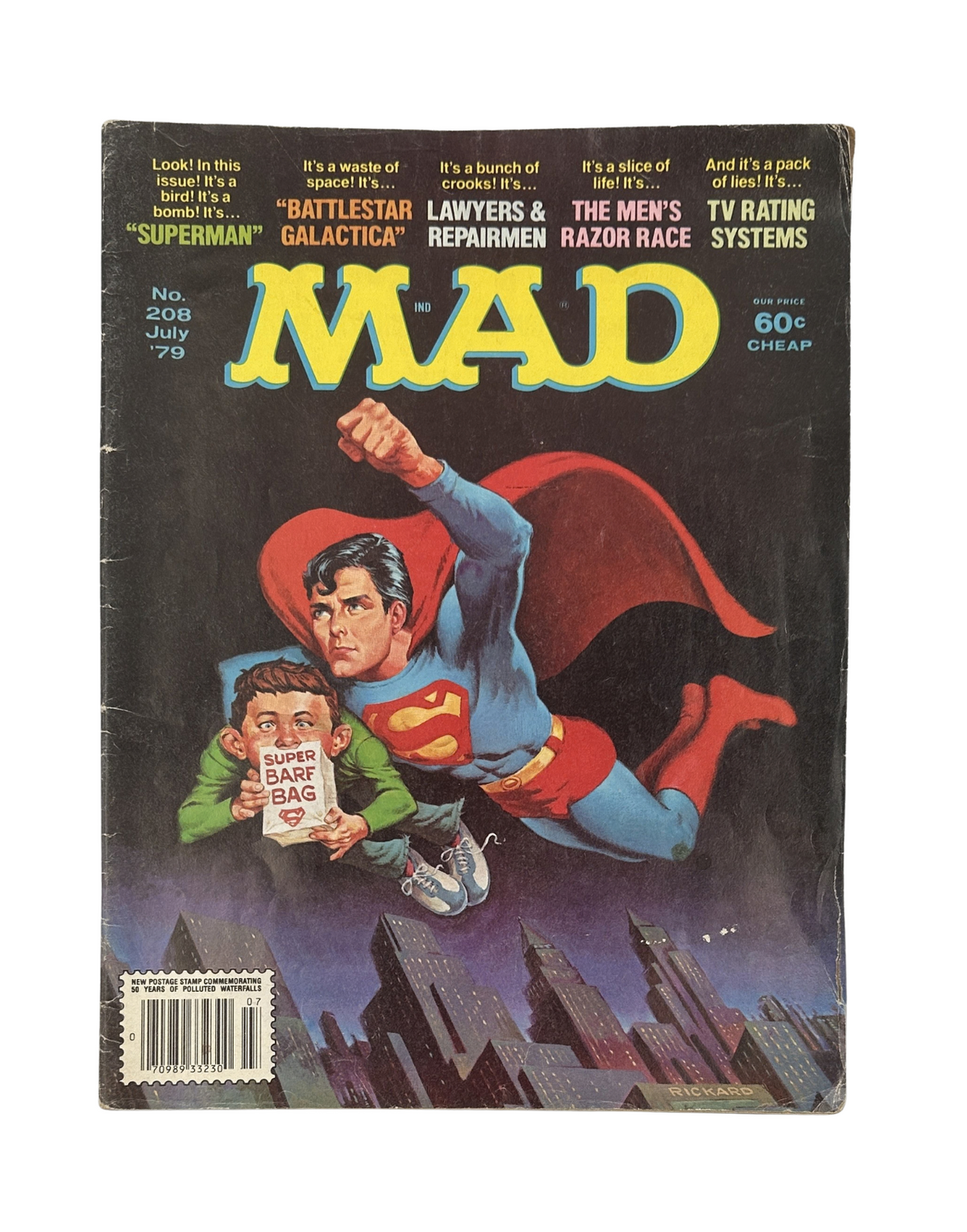 Cover of MAD Magazine No. 208 from July 1979 featuring Superman in a dynamic pose, illustrating satire on Superman and Battlestar Galactica. The magazine is graded Very Good (VG 4.0) with signs of age such as cover creases and edge wear.