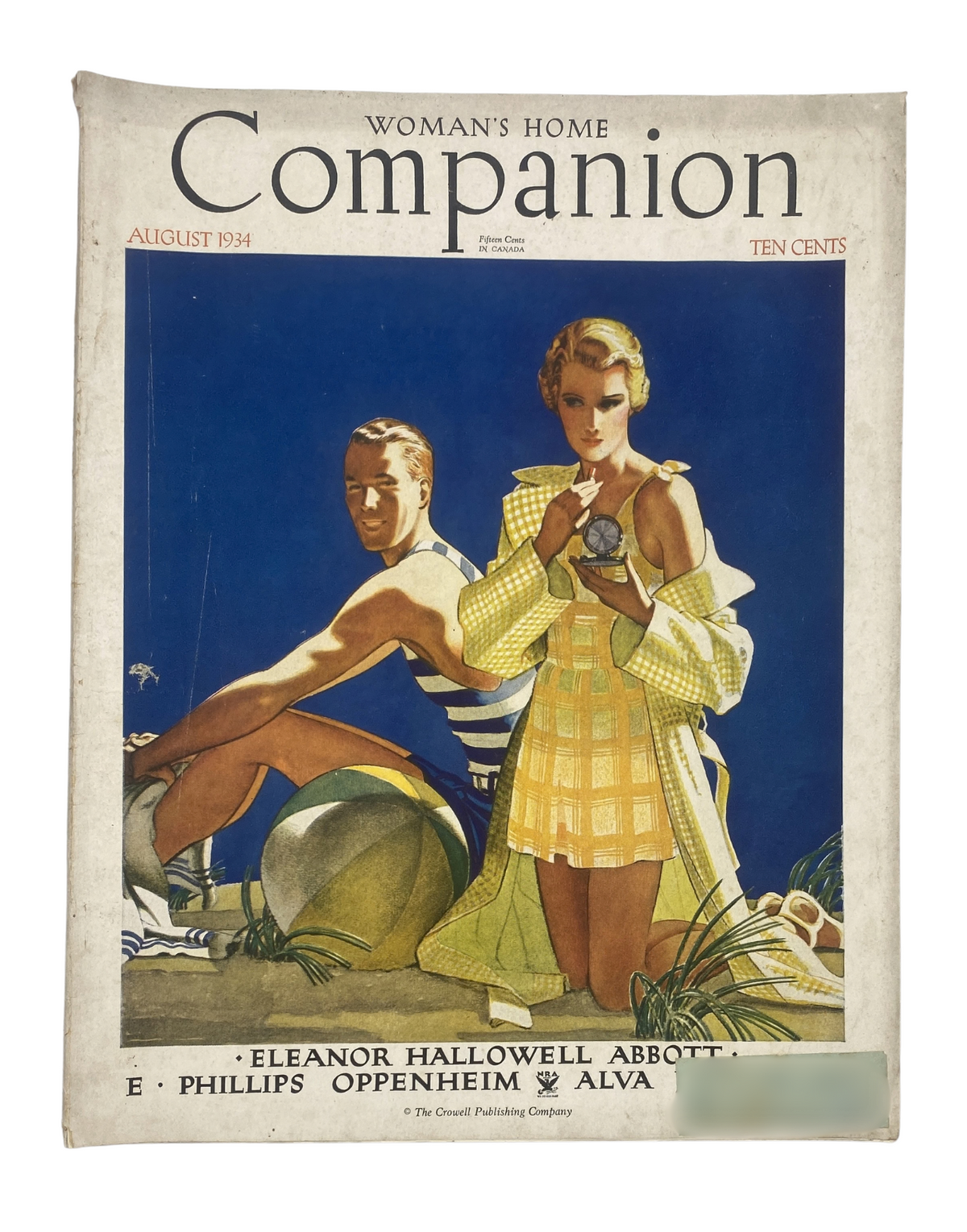 Cover of Woman's Home Companion Magazine from August 1934 featuring artwork by E. Phillips Oppenheim and depicting a woman in a stylish outfit alongside a man in swimwear. Highlights include references to Eleanor Hallowell Abbott and Amelia Earhart.