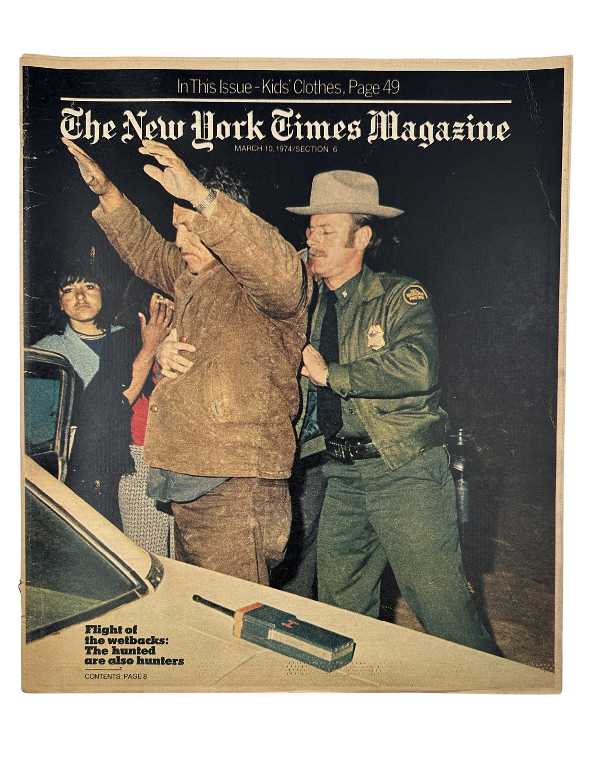 Cover of The New York Times Magazine dated March 10, 1974, featuring a Border Patrol agent apprehending a man, highlighting the theme 'Flight of the Wetbacks'.