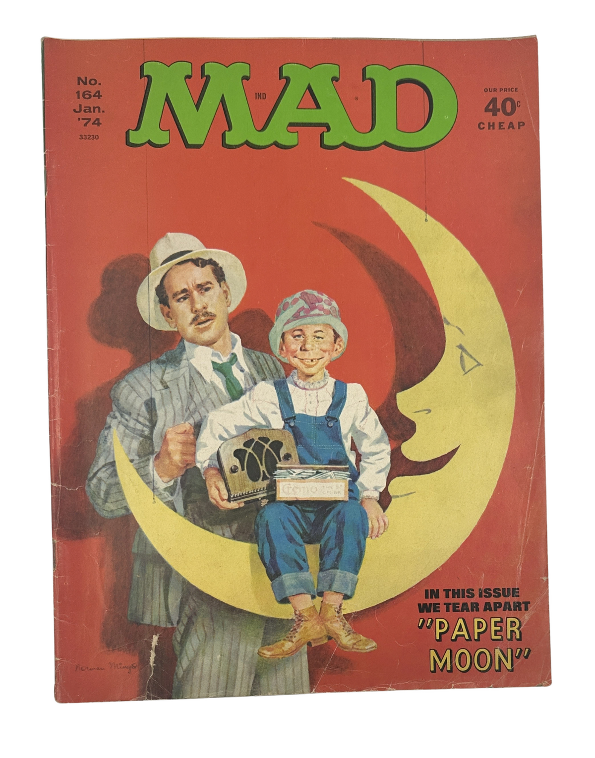 Cover of MAD Magazine No. 164 from January 1974 featuring a whimsical illustration of a man in a striped suit and boy sitting on a large crescent moon, showcasing the title 'MAD' prominently.