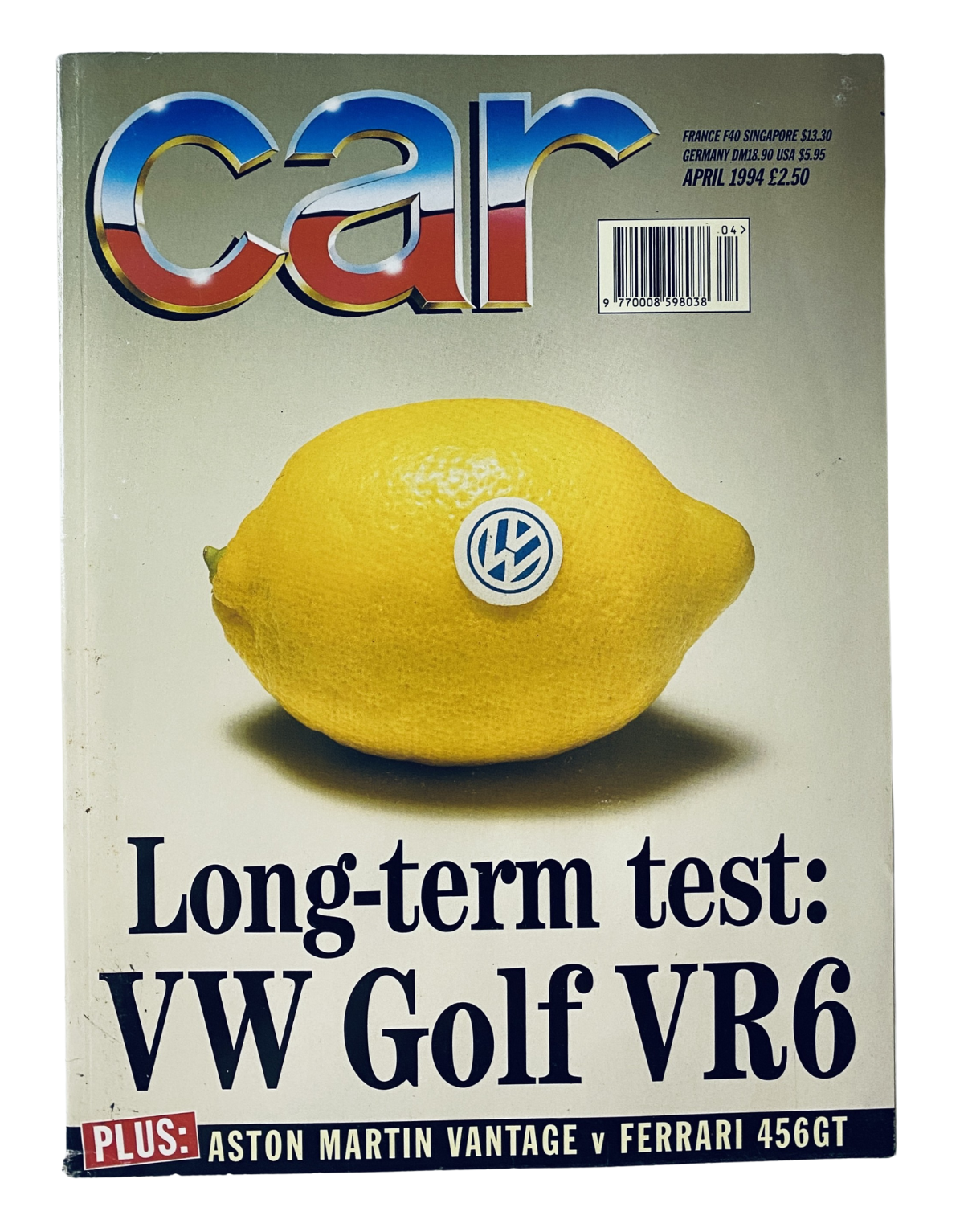 Cover of CAR Magazine April 1994 featuring a lemon with VW Golf VR6 branding, highlighting a long-term test of the VW Golf VR6 and comparisons of Aston Martin Vantage vs Ferrari 456GT.
