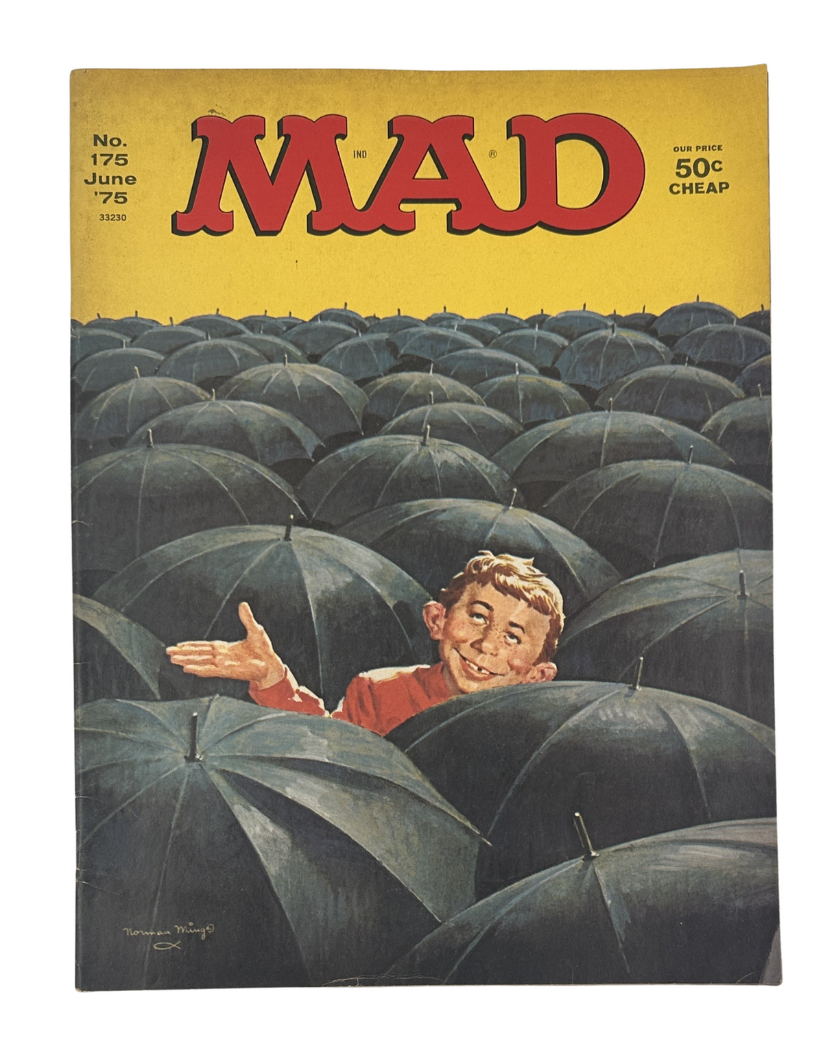 MAD Magazine No. 175 from June 1975 featuring a colorful cover illustration of a boy with two umbrellas, emphasizing the humorous theme of the issue.