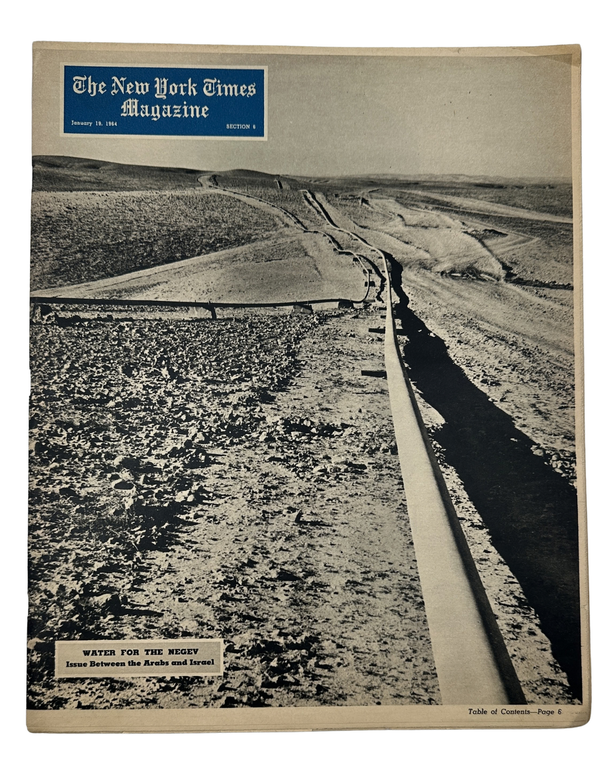 The New York Times Magazine January 19, 1964 cover featuring a black and white photograph depicting a pipeline in the Negev desert, illustrating the topic 'Water for the Negev' and the irrigation project involving Jordan River water.