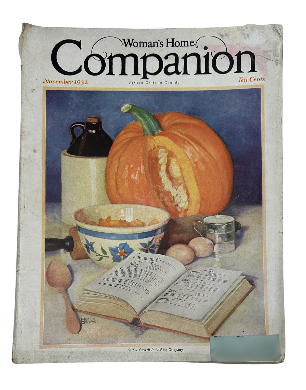 Cover of Woman’s Home Companion Magazine from November 1932 featuring a pumpkin, cooking ingredients, and recipes, with a beautiful illustration by Marion Powers.