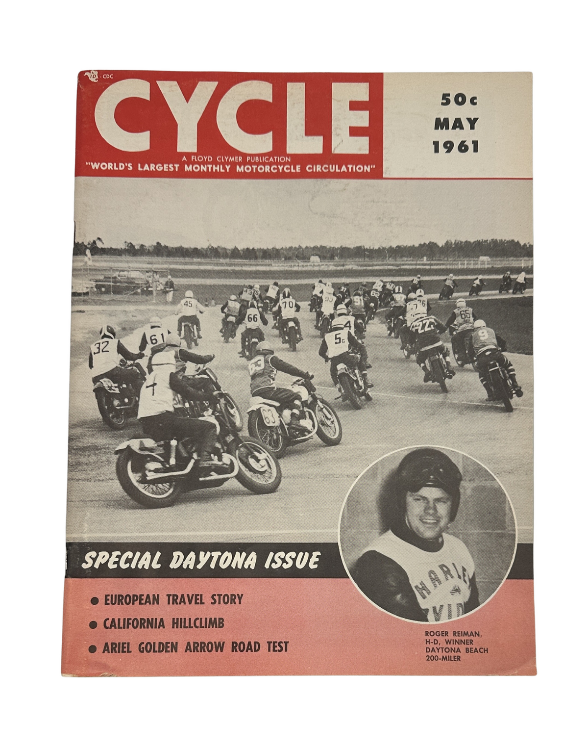 Cycle Magazine May 1961 cover featuring Roger Reiman after winning the Daytona 200-Miler, showcasing motorcycles on the track and a feature on the Ariel Golden Arrow road test.