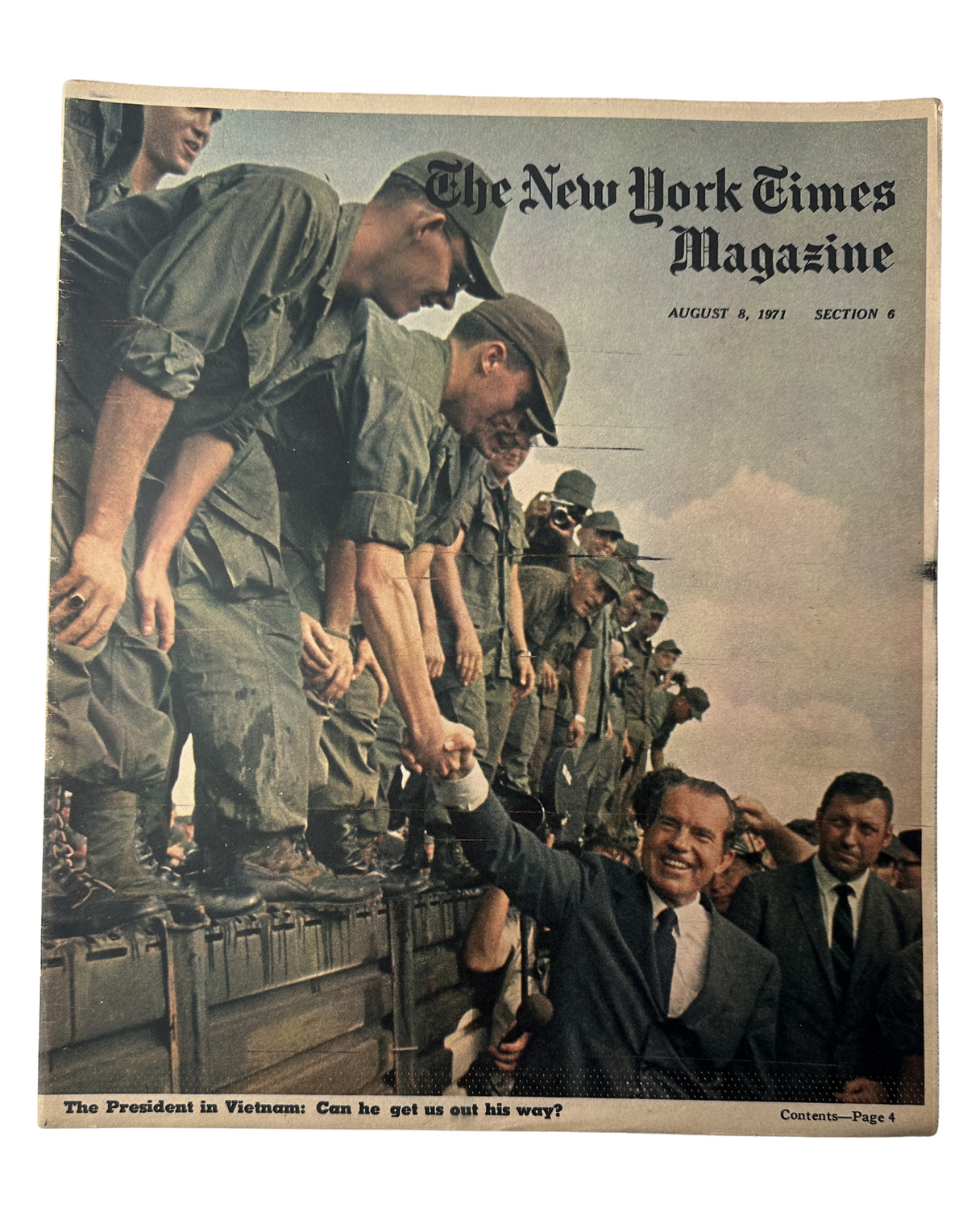 The New York Times Magazine August 8, 1971 Nixon Vietnam Cover, featuring President Nixon shaking hands with U.S. troops in Vietnam, showcasing the theme 'Can he get us out of his way?'. Rare historical publication.