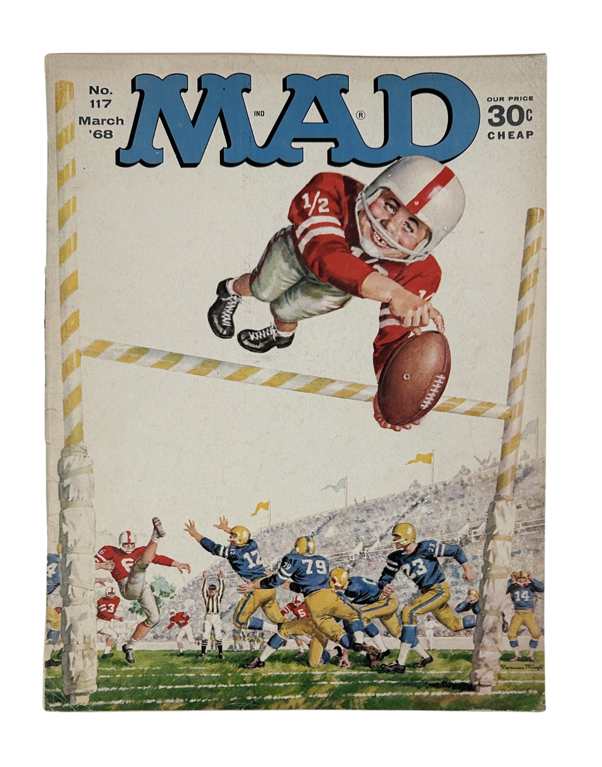 MAD Magazine No. 117 from March 1968 featuring a dynamic cover illustration of a boy in a football jersey leaping to catch a football, with a background depicting a football game in action. This issue includes satire-related articles and is in Fine condition.