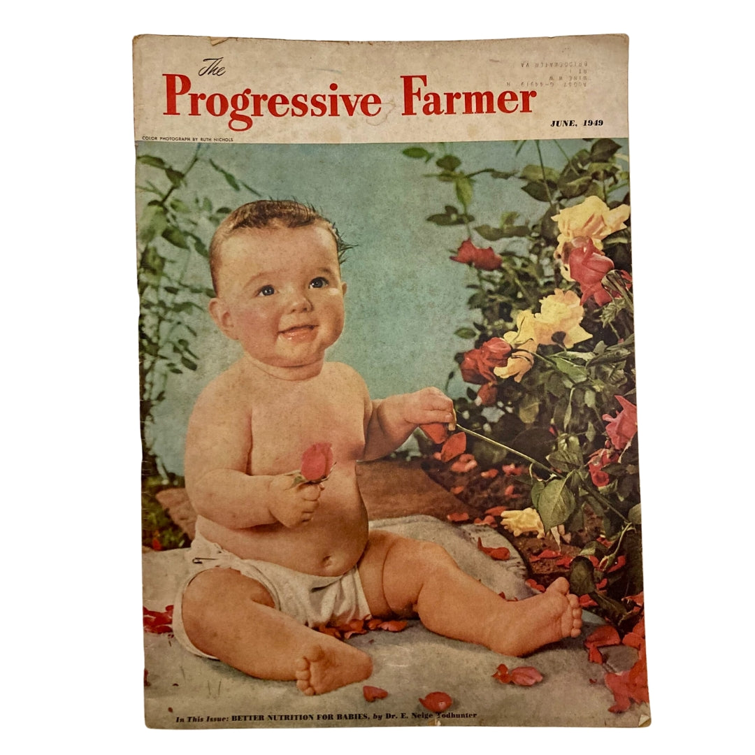 Cover of The Progressive Farmer Magazine June 1949 featuring a cheerful baby holding roses, symbolizing the theme of growth and agriculture.