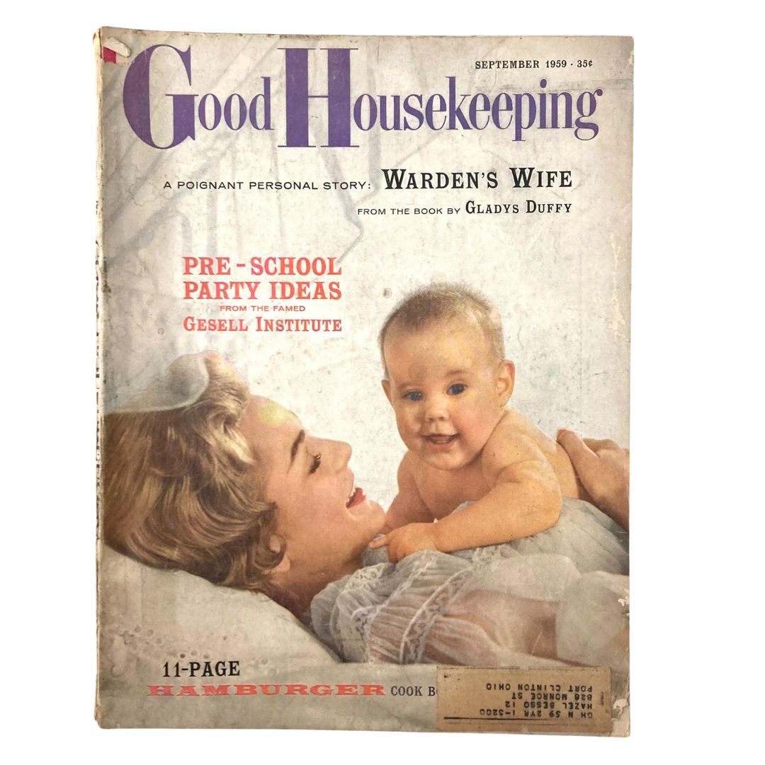 Vintage Good Housekeeping Magazine from September 1959 featuring a poignant personal story titled 'Warden's Wife' with a cover displaying a happy mother and baby, showcasing mid-century family themes.