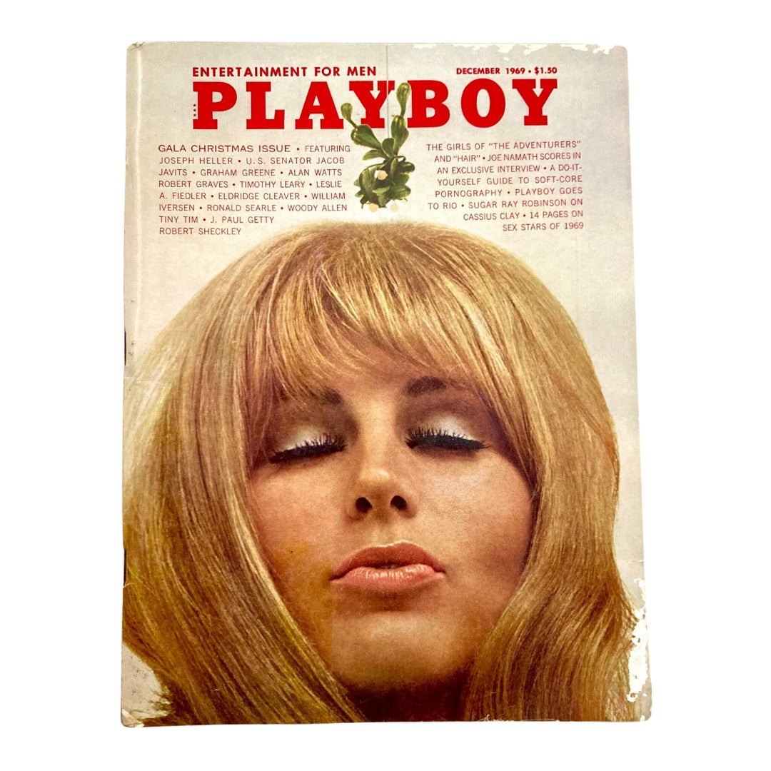 Vintage Playboy Magazine December 1969 cover featuring Playmate Gloria Root with glamorous hairstyle and makeup, highlighting the iconic pop culture aesthetics of the era.